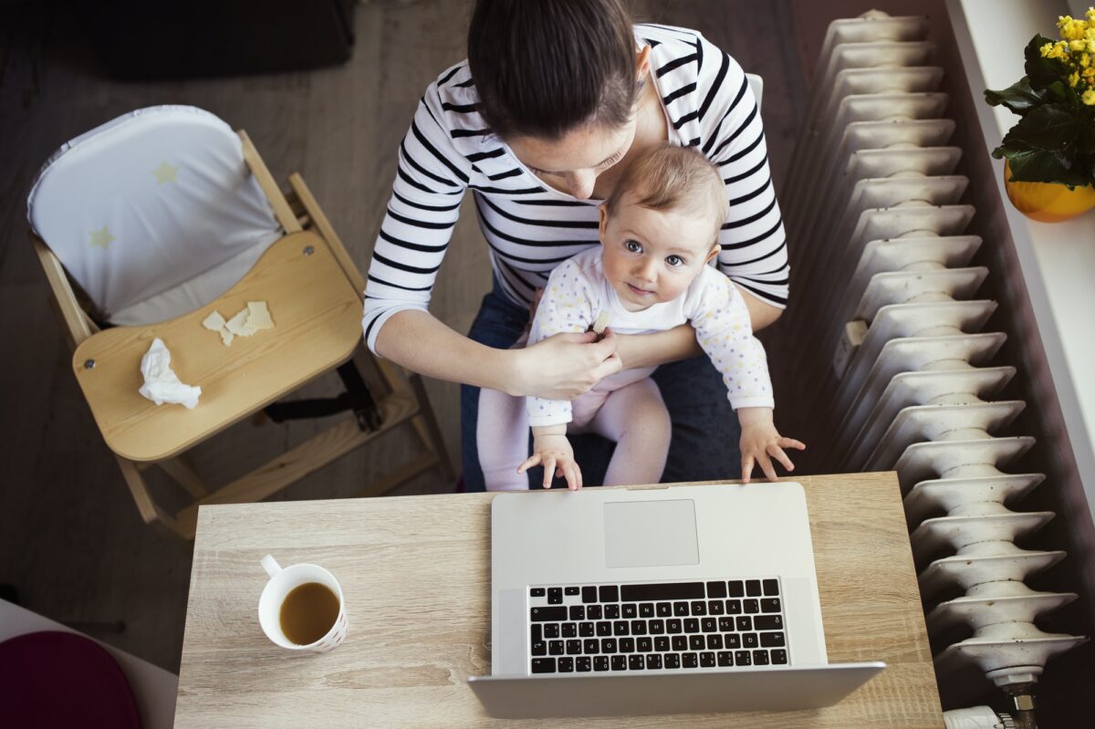 Young mother working from home